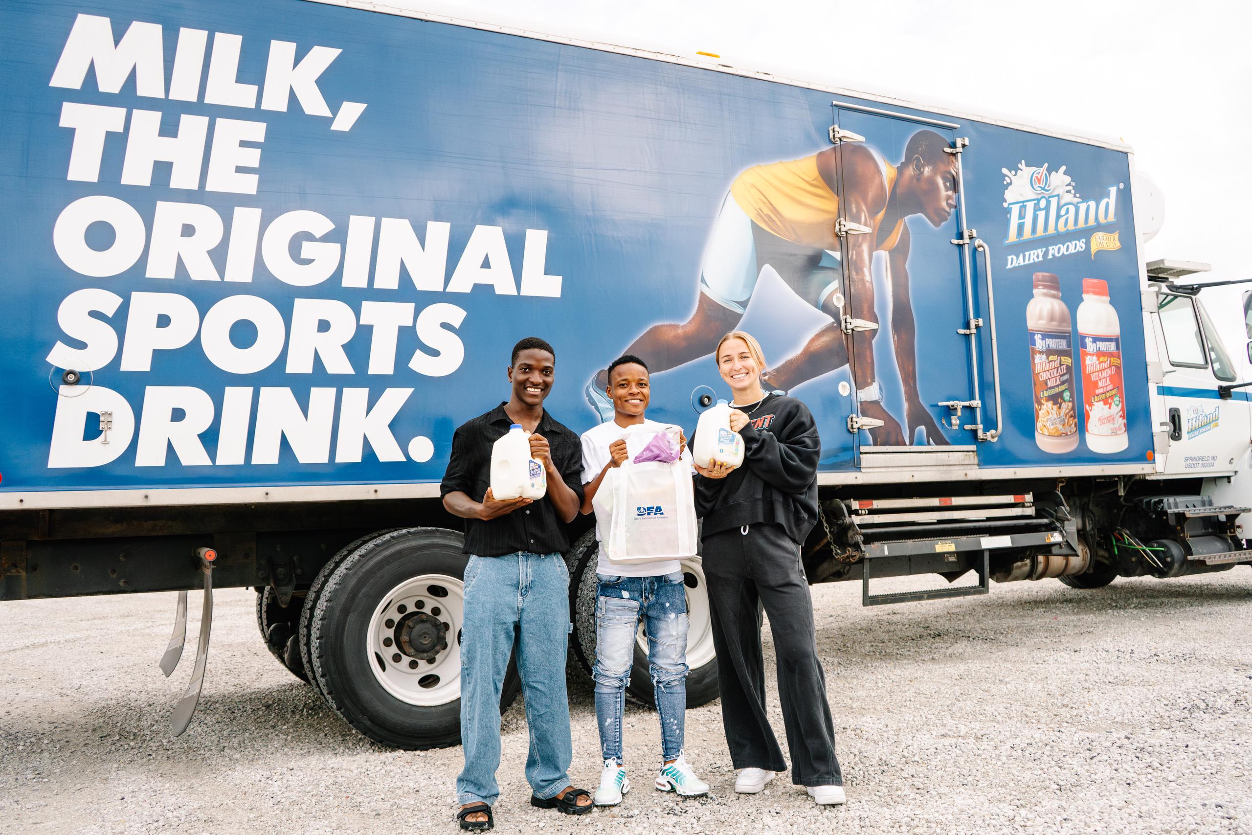 Temwa, Jereko and Hailie donating milk