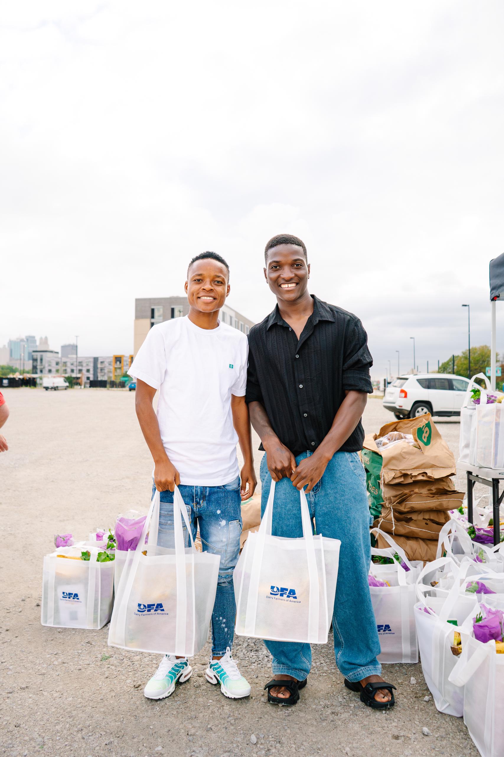 Temwa and Jereko donating milk