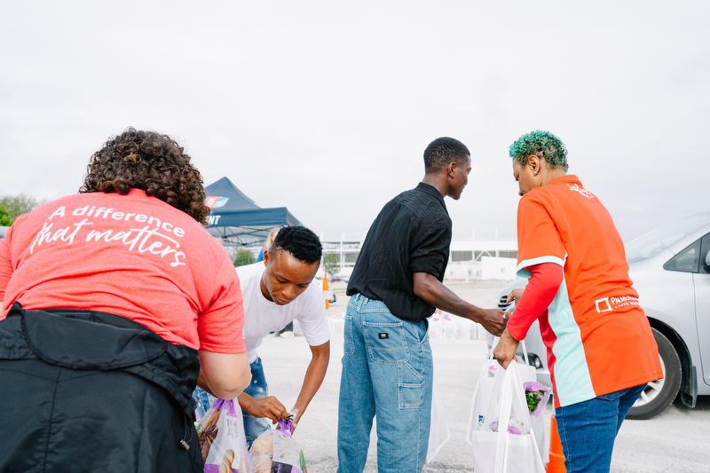 Jereko and Temwa donating milk