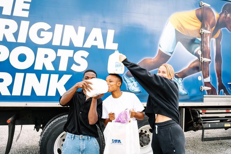 Temwa, Jereko and Hailie donating milk