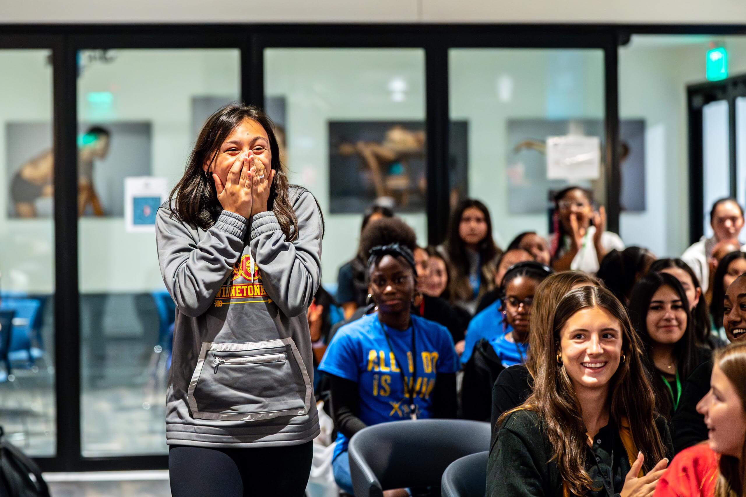 A student at the blue KC sideline the stigma empower her event wins a prize.